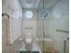 Bathroom with walk-in shower and grab bars at 5028 San Massimo Dr, Punta Gorda, FL 33950