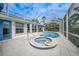 Screened-in spa and pool area with water views at 5028 San Massimo Dr, Punta Gorda, FL 33950