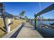 Concrete boat dock offering convenient access to the water at 525 Port Bendres Dr, Punta Gorda, FL 33950