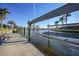 Private boat dock with lift and seating area, perfect for enjoying waterfront living at 525 Port Bendres Dr, Punta Gorda, FL 33950