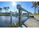 Private boat lift on a peaceful canal at 525 Port Bendres Dr, Punta Gorda, FL 33950