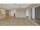 Bright dining room with tile floors and access to the kitchen at 525 Port Bendres Dr, Punta Gorda, FL 33950