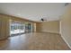 Living room with sliding doors to pool area at 525 Port Bendres Dr, Punta Gorda, FL 33950