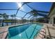 Inviting screened pool area with ample deck space at 525 Port Bendres Dr, Punta Gorda, FL 33950