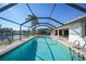 Relaxing screened pool and patio area at 525 Port Bendres Dr, Punta Gorda, FL 33950