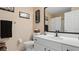 Clean bathroom with white vanity, large mirror, and shower at 5725 Greenwood Ave # 7203, North Port, FL 34287