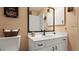 Clean bathroom with white vanity, large mirror, and shower at 5725 Greenwood Ave # 7203, North Port, FL 34287