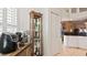 Kitchen area with coffee bar and display cabinet at 5725 Greenwood Ave # 7203, North Port, FL 34287