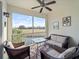 Relaxing screened-in lanai overlooking a pond at 700 Gardens Edge Dr # 722, Venice, FL 34285