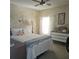 Comfortable bedroom with dresser and a charming atmosphere at 735 Blackburn Blvd, North Port, FL 34287