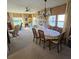 Dining room with table and chandelier at 735 Blackburn Blvd, North Port, FL 34287