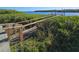 Wooden dock extending over tranquil waters at 735 Blackburn Blvd, North Port, FL 34287