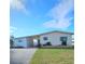 Single story home with carport at 735 Blackburn Blvd, North Port, FL 34287