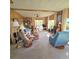 Spacious living room with recliner chairs at 735 Blackburn Blvd, North Port, FL 34287