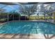 Beautiful screened pool overlooking tranquil landscape at 7352 Parkinsonia, Punta Gorda, FL 33955