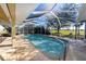 Inviting screened pool with ample patio space at 7352 Parkinsonia, Punta Gorda, FL 33955