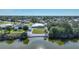 Single-Gathering home on waterfront lot with canal access at 7435 Snow Dr, Englewood, FL 34224