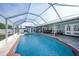 Relaxing screened pool and patio area at 7435 Snow Dr, Englewood, FL 34224