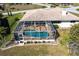 Aerial view of home with pool and backyard at 900 Genoa Ct, Punta Gorda, FL 33950