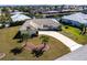 Aerial view of the property, highlighting its location and landscaping at 900 Genoa Ct, Punta Gorda, FL 33950