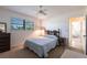 Bright bedroom with double bed and view of garden at 900 Genoa Ct, Punta Gorda, FL 33950