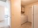 Laundry room with washer, dryer and access to living area at 900 Genoa Ct, Punta Gorda, FL 33950