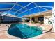 Relaxing pool and patio area with seating at 900 Genoa Ct, Punta Gorda, FL 33950