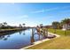 Scenic canal view with private dock and boat slips at 900 Genoa Ct, Punta Gorda, FL 33950