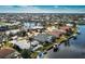 Aerial view of waterfront home with pool and private dock at 1014 Francesca Ct, Punta Gorda, FL 33950