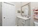 Clean bathroom with a quartz countertop and modern vanity at 1014 Francesca Ct, Punta Gorda, FL 33950