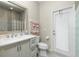 Bathroom with walk-in shower, quartz countertop, and modern vanity at 1014 Francesca Ct, Punta Gorda, FL 33950