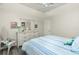 Bedroom with queen bed, ceiling fan, and dresser at 1014 Francesca Ct, Punta Gorda, FL 33950