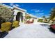 Inviting home exterior featuring landscaping and a paved driveway at 1014 Francesca Ct, Punta Gorda, FL 33950