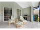Covered patio with wicker furniture and a view of the pool at 1014 Francesca Ct, Punta Gorda, FL 33950