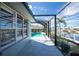 Walkway alongside the pool and canal view at 1014 Francesca Ct, Punta Gorda, FL 33950