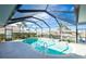 Enclosed pool and lanai with canal view at 1014 Francesca Ct, Punta Gorda, FL 33950