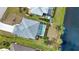Single-Gathering home with pool and canal view, aerial view at 110 Albatross Rd, Rotonda West, FL 33947