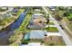 Houses with pools and canal view, aerial view at 110 Albatross Rd, Rotonda West, FL 33947