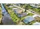 Houses with pools and canal view, aerial view at 110 Albatross Rd, Rotonda West, FL 33947