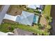 Aerial view showing home's pool and location within the community at 110 Albatross Rd, Rotonda West, FL 33947