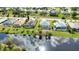 Community overview with several houses and canal at 110 Albatross Rd, Rotonda West, FL 33947