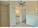 Bathroom with shower, sink, vanity and linen closet at 110 Albatross Rd, Rotonda West, FL 33947