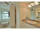 Bathroom with shower, sink, and vanity, and a view at 110 Albatross Rd, Rotonda West, FL 33947