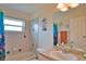 Bathroom with tub, sink and decorative nautical theme at 110 Albatross Rd, Rotonda West, FL 33947