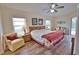 Main bedroom with king-size bed and access to the pool at 110 Albatross Rd, Rotonda West, FL 33947