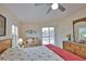 Main bedroom with king-size bed and pool view at 110 Albatross Rd, Rotonda West, FL 33947