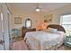 Bedroom with full-size bed and access to the pool at 110 Albatross Rd, Rotonda West, FL 33947