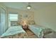 Bedroom with two twin-size beds at 110 Albatross Rd, Rotonda West, FL 33947
