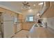 Clean kitchen featuring white appliances and light cabinetry at 110 Albatross Rd, Rotonda West, FL 33947