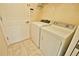 Laundry room with washer and dryer, and additional storage at 110 Albatross Rd, Rotonda West, FL 33947